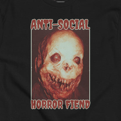 Black Gildan Unisex T-Shirt with 'Anti-social Horror Fiend' text graphic and a scary, monstrous face illustration. 